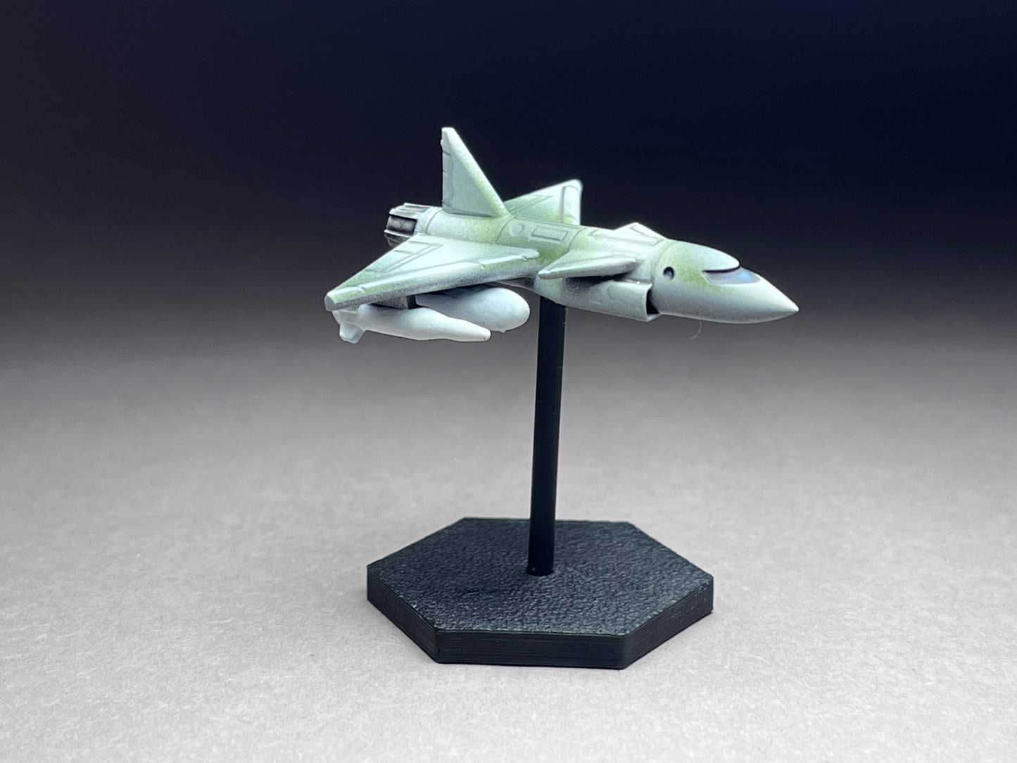 6-8mm scale - Spectre Multirole Fighter + full weapon loadout: AA missiles, guided bomb, canons, drop tanks. Base and stand UNPAINTED, This is NOT a toy!