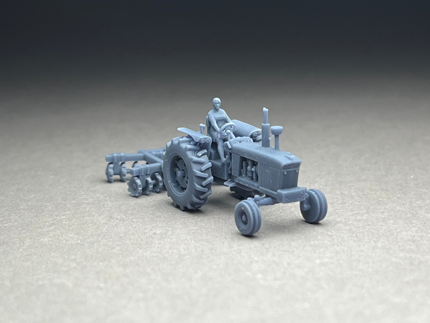 UNPAINTED N Scale (1:160 or 12mm) One (1) Model 4020 Female driver w harrow - NOT A TOY