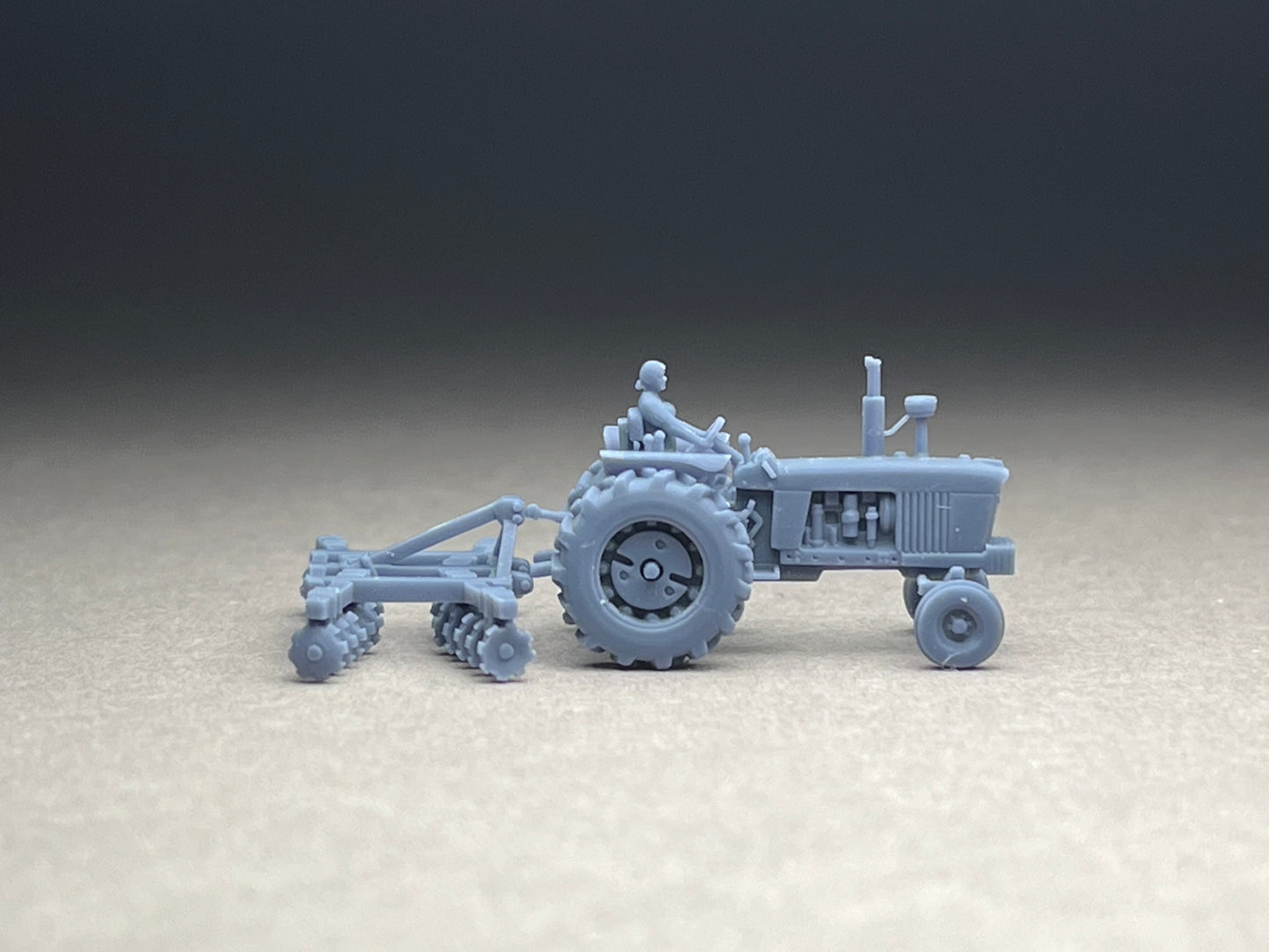 UNPAINTED N Scale (1:160 or 12mm) One (1) Model 4020 Female driver w harrow - NOT A TOY