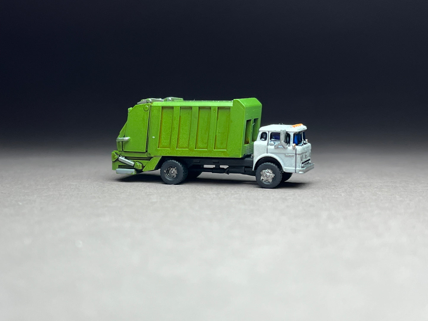 Z Scale (1:220) UNPAINTED One (1) C-series Garbage Truckl with Crew - NOT a toy!