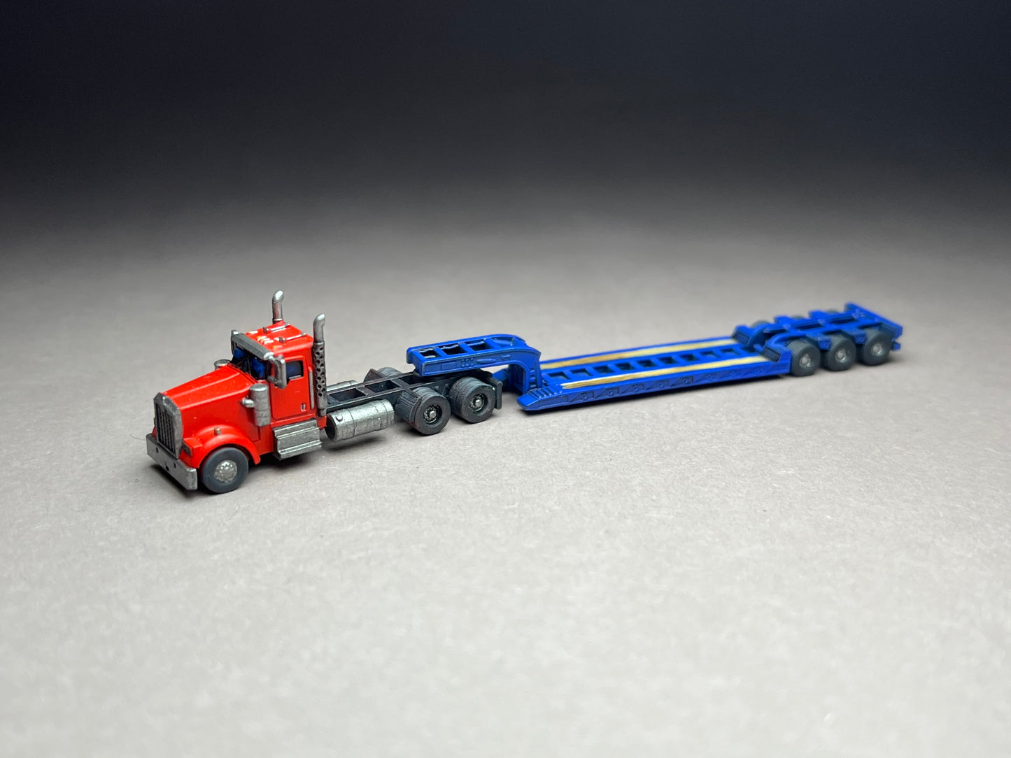 Z Scale (1:220) UNPAINTED One (1) RGN Lowboy with folded outrigs - NOT a toy!
