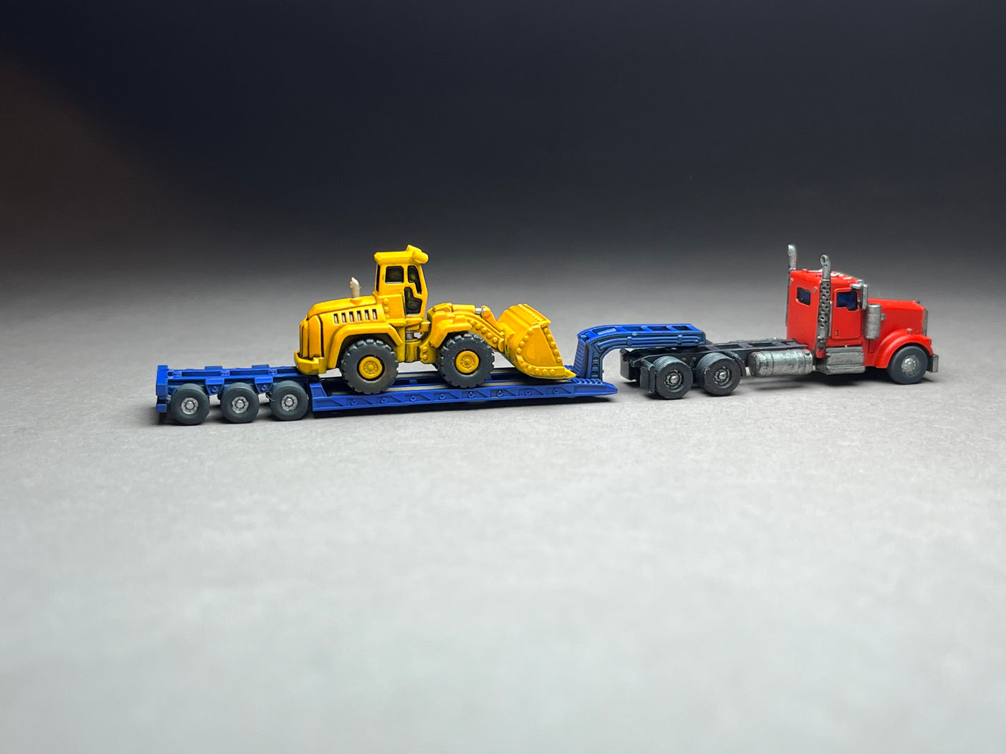 Z Scale (1:220) UNPAINTED One (1) RGN Lowboy with folded outrigs - NOT a toy!